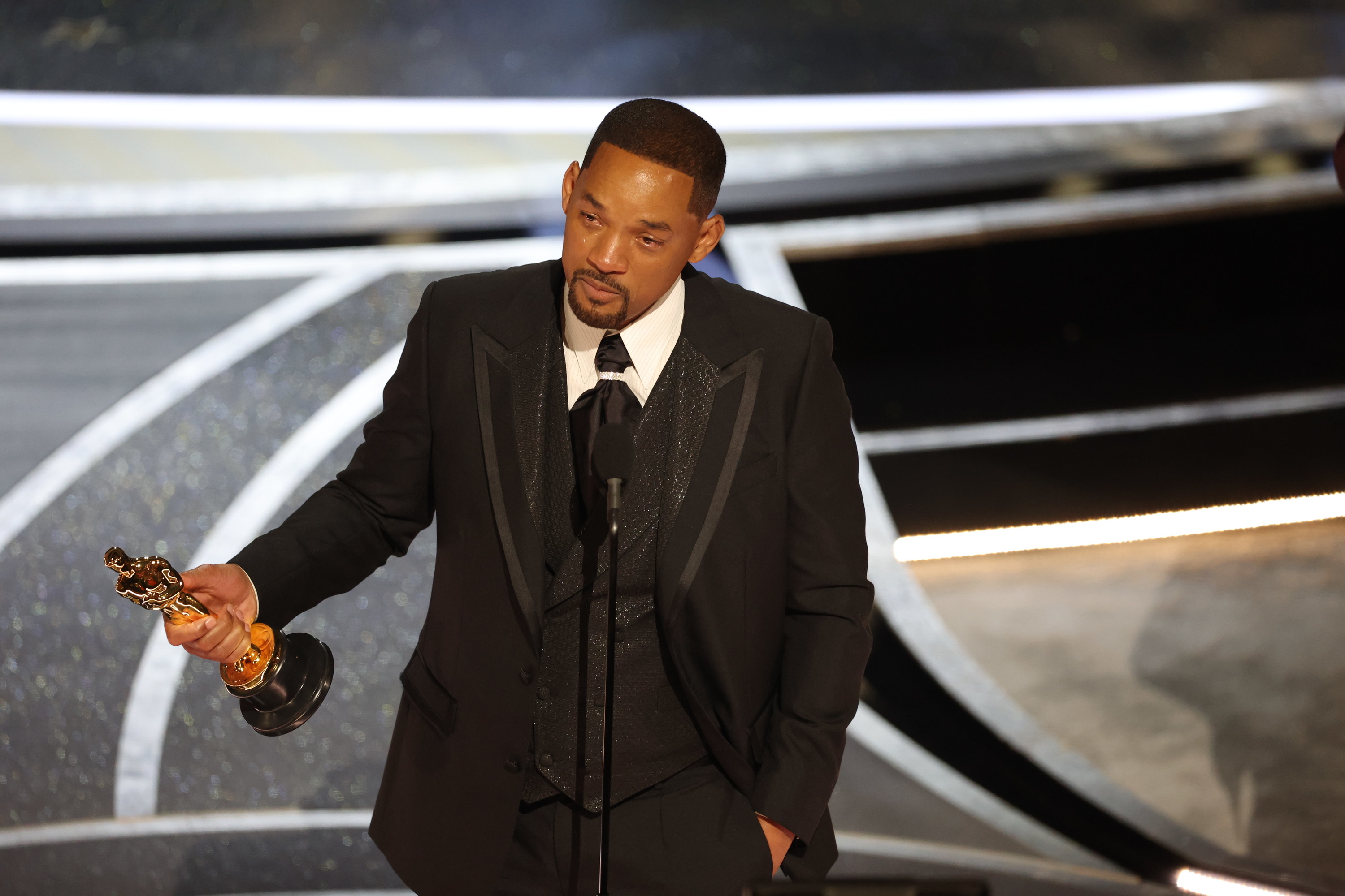 Will onstage holding his Oscar
