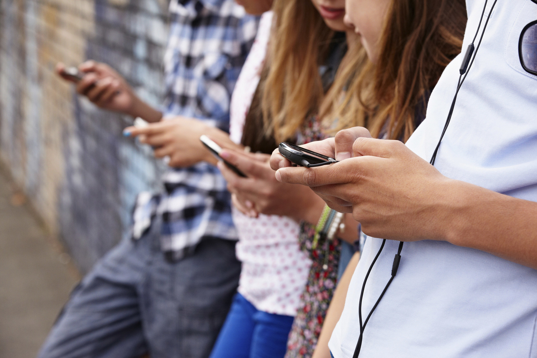 Teens on their phones