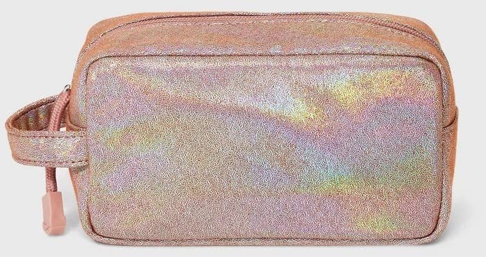 The pink holographic toiletries bag