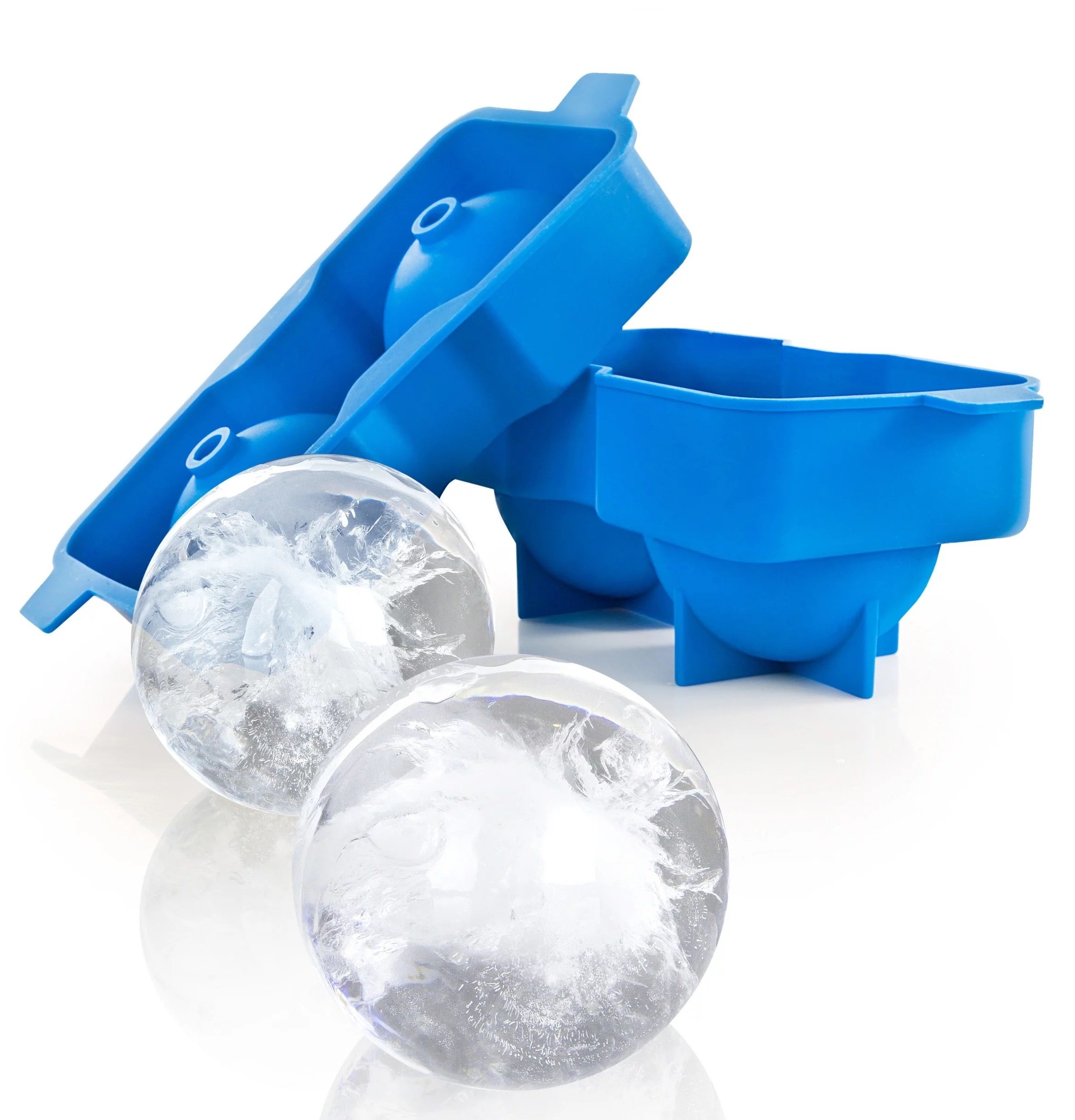 a blue ice ball tray with two ice cubes in a ball form