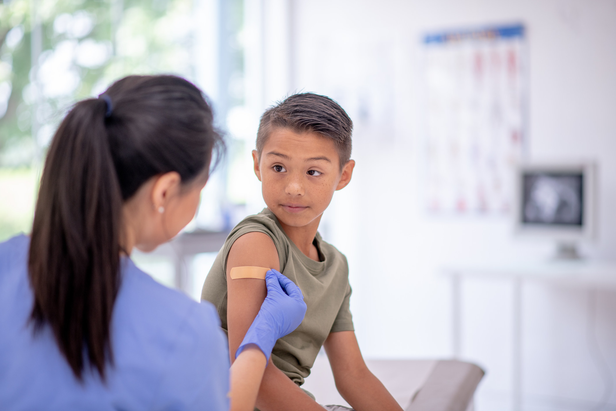 A nurse with a child patient