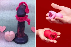 Purple silicone dildo decorated with pipe cleaners and hands holding red and pink anal plug with heart-shaped bejeweled bases