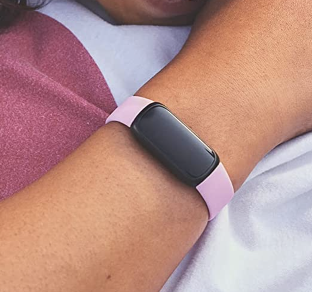 the FitBit on a model&#x27;s wrist