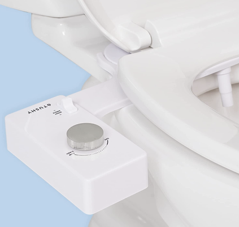 the bidet attachment on a toilet