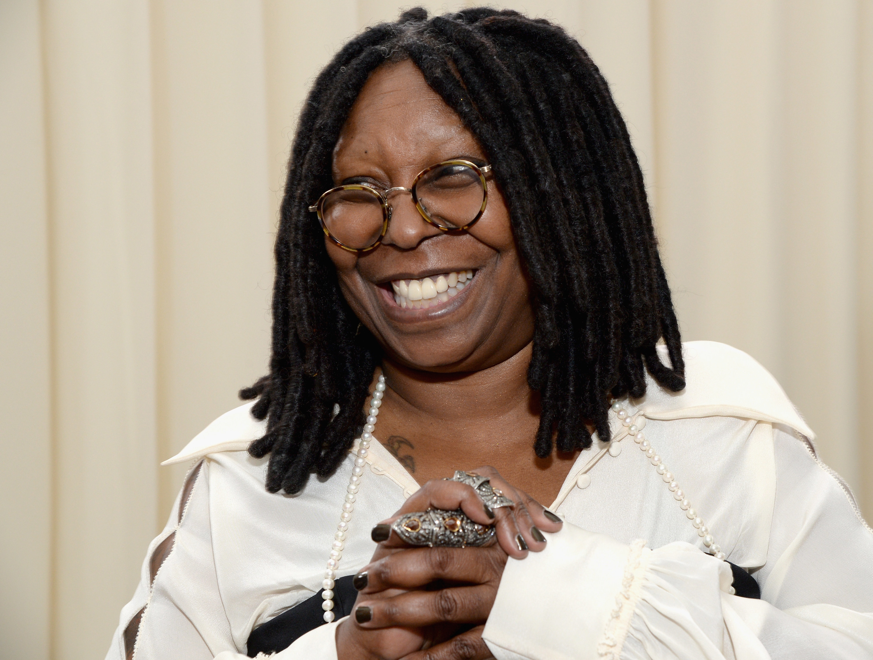 Whoopi Goldberg smiling