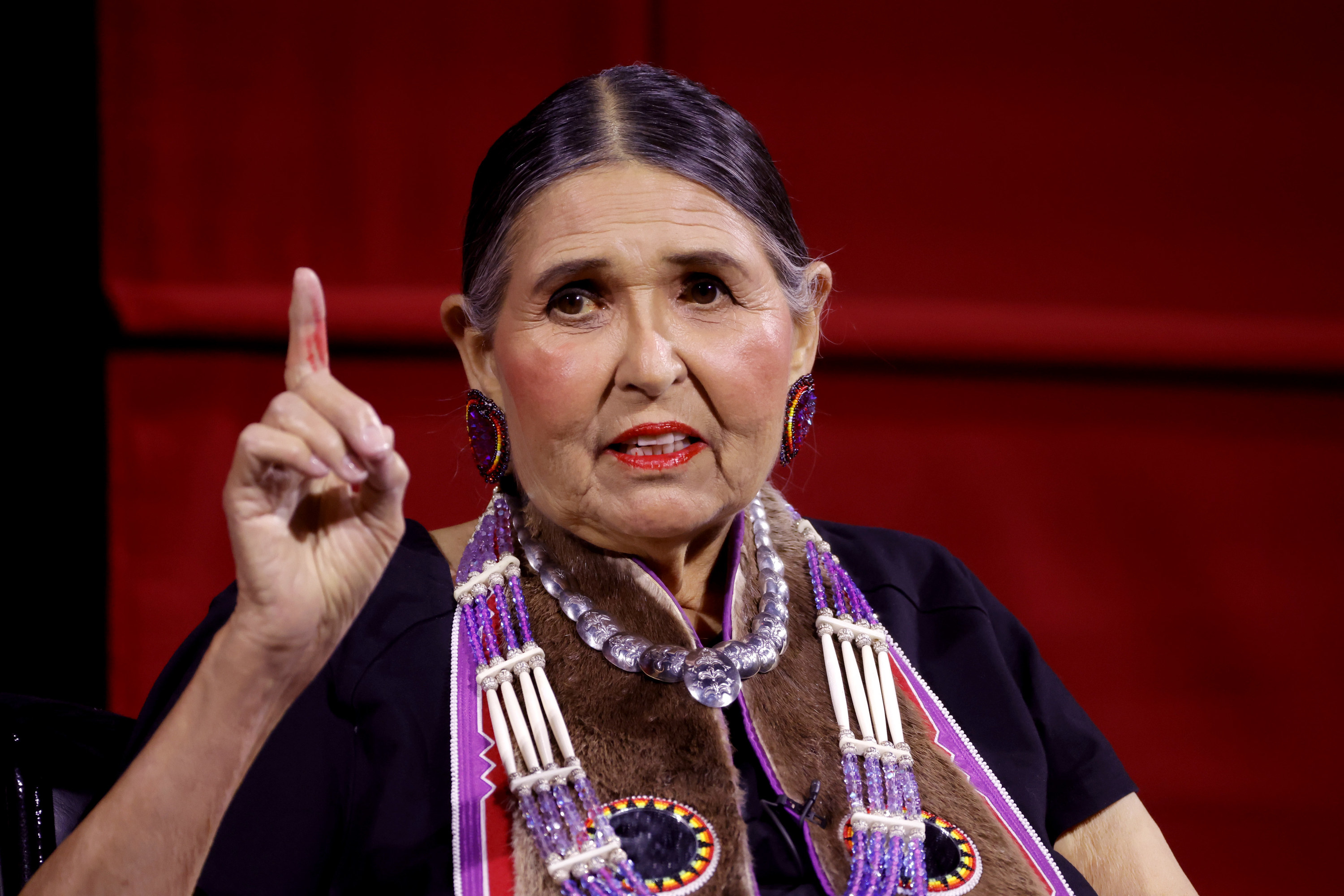 Sacheen Littlefeather speaking on stage