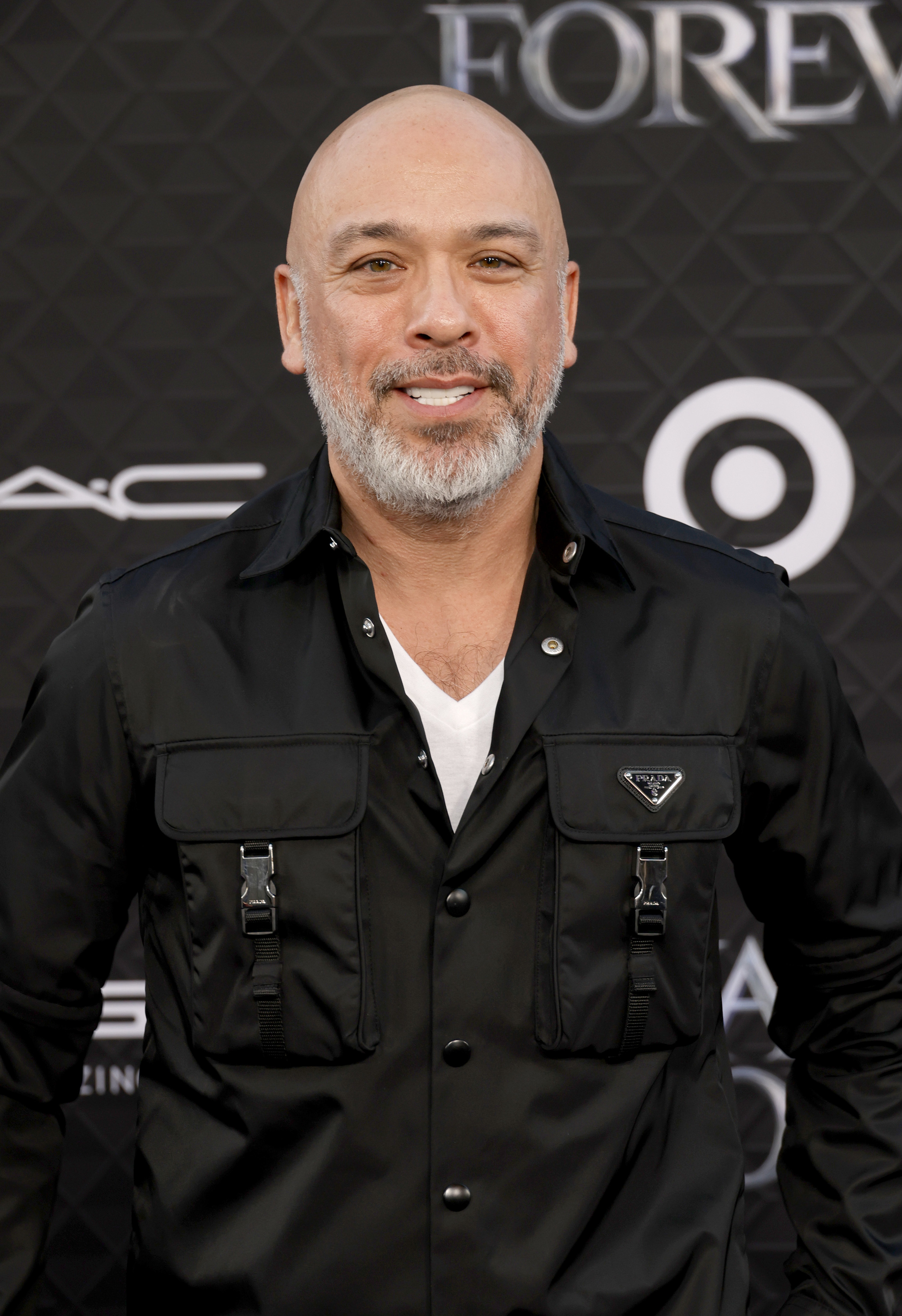 A close-up of Jo Koy at a red carpet event