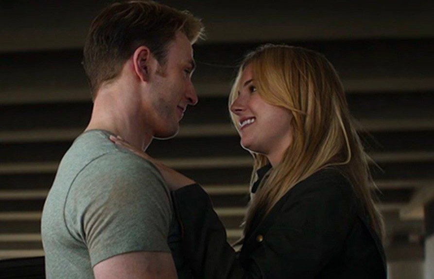 Steve and Sharon embrace while smiling