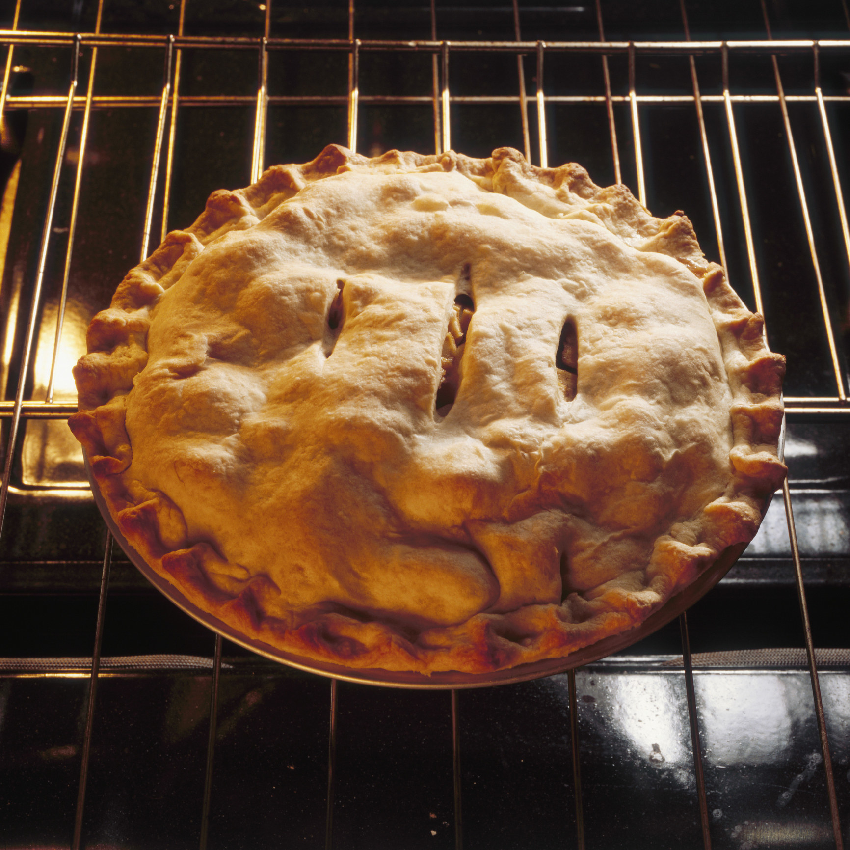 An apple pie in the oven.
