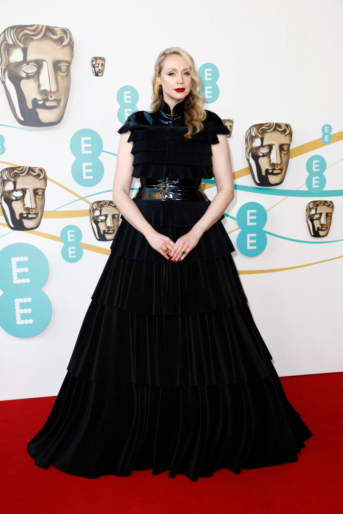 Gwendoline Christie attends the EE BAFTA Film Awards 2023 at The Royal Festival Hall in a high-neck gown