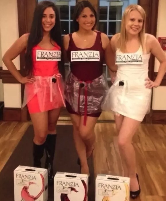 three girls dressed as boxes of wine