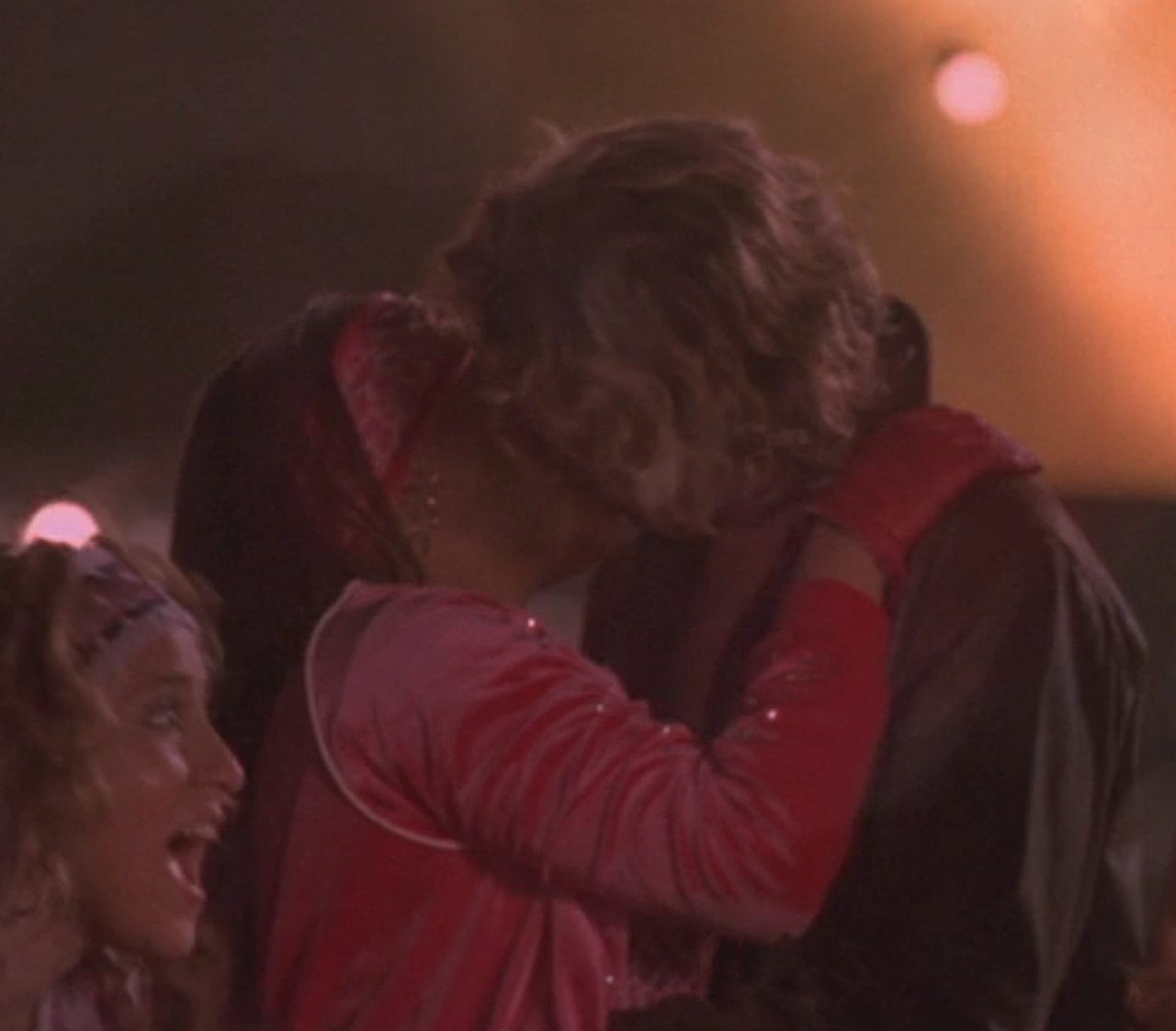 Raven as Galleria and Kyle Schmid as Derek kiss