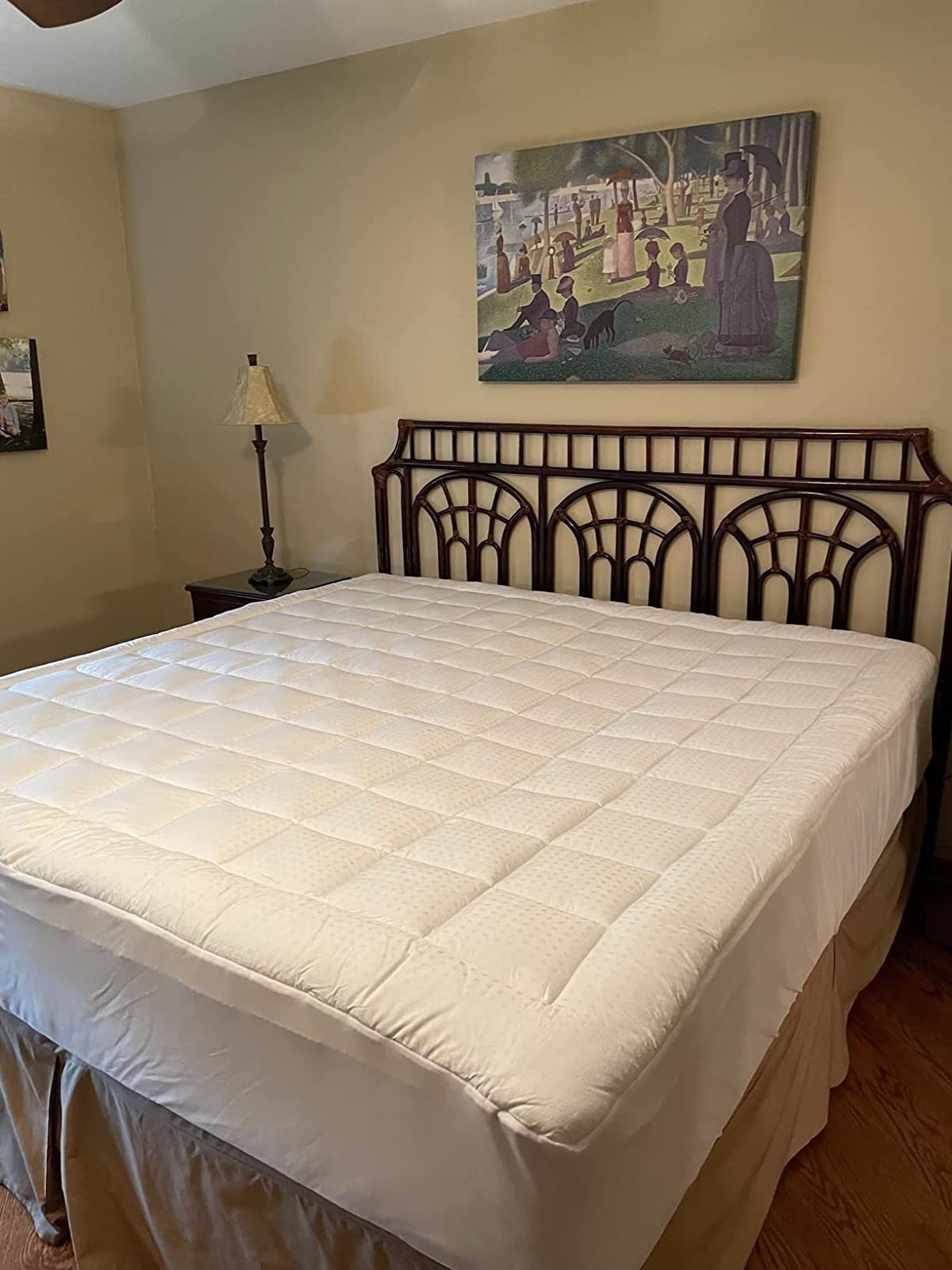 Reviewer image of mattress pad on their bed