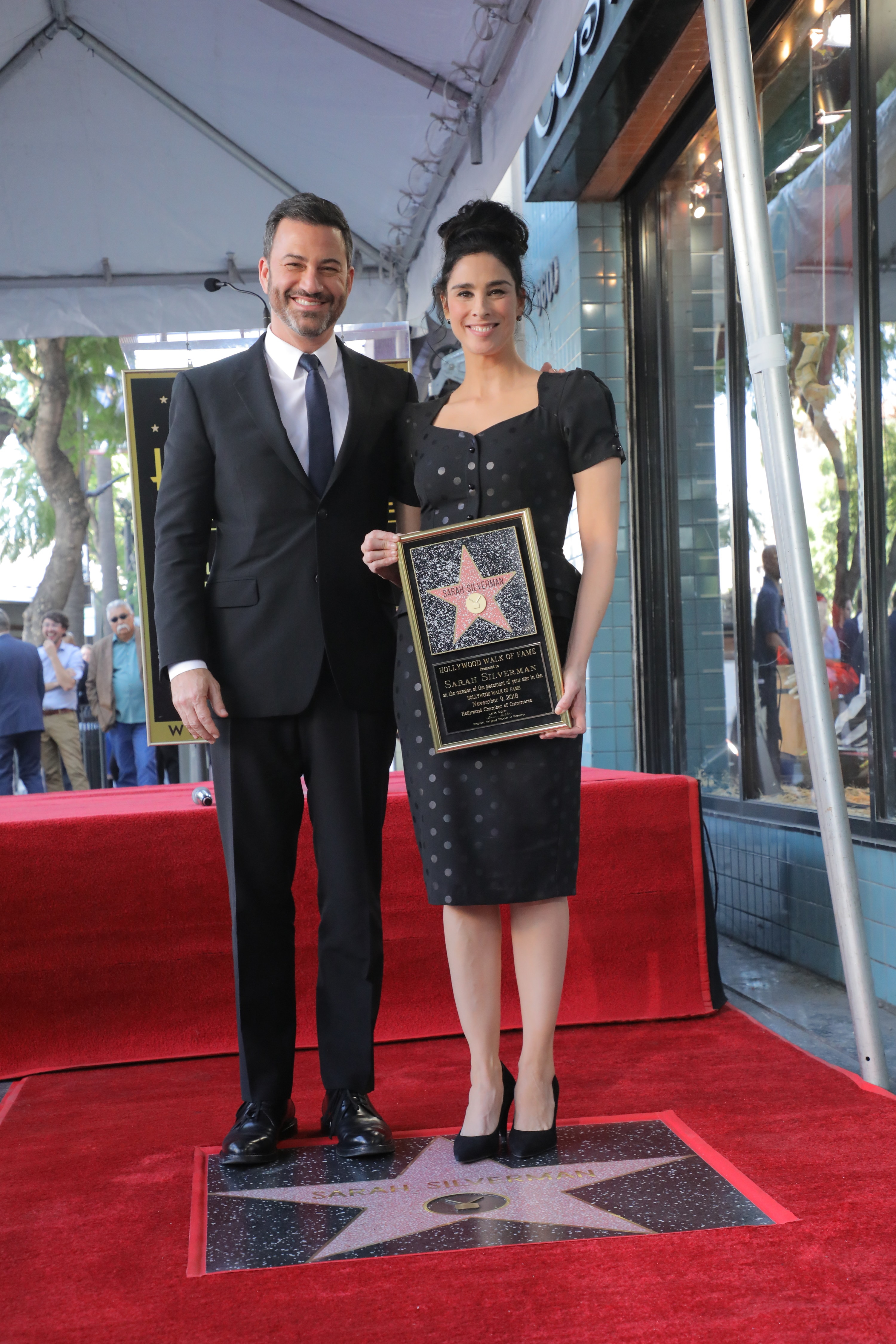 Jimmy Kimmel and Sarah Silverman posing together as she gets her star on the Hollywood Walk of Fame