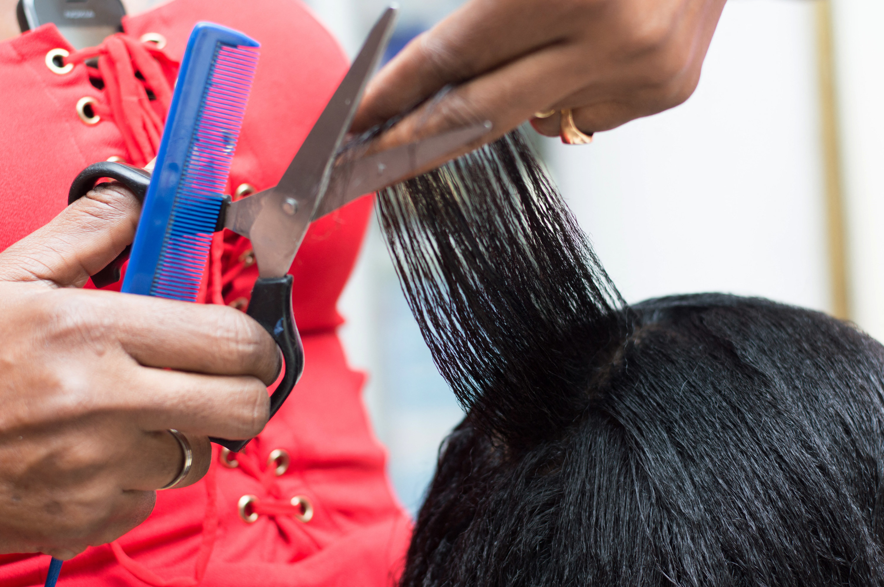 hairdresser cuts hair