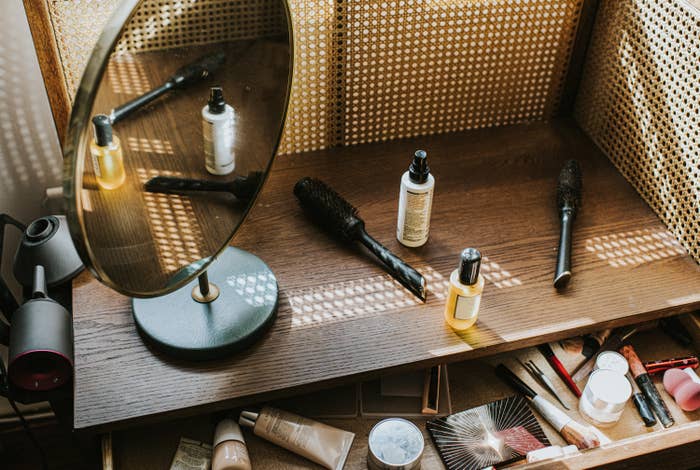 makeup products on vanity table