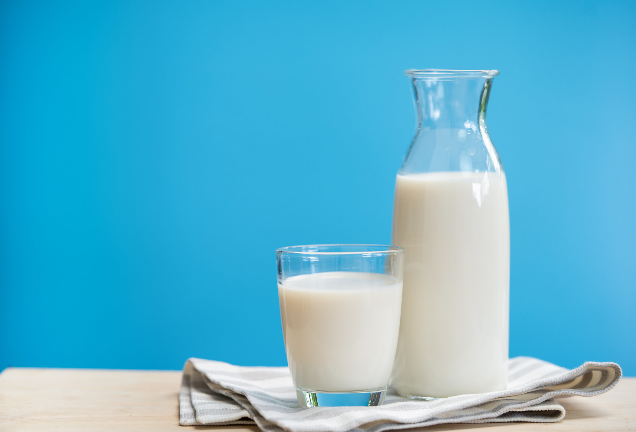 Milk in carafe with glass