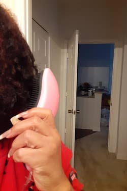 reviewer using pink brush