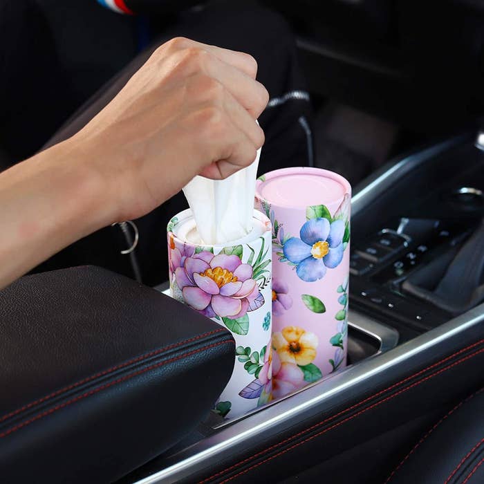 Two tissue holders in car cupholders