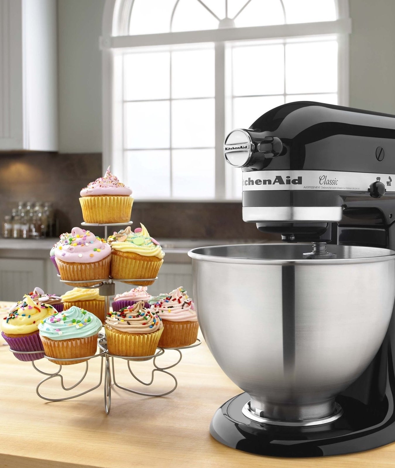 The KitchenAid mixer with a large bowl on a kitchen counter