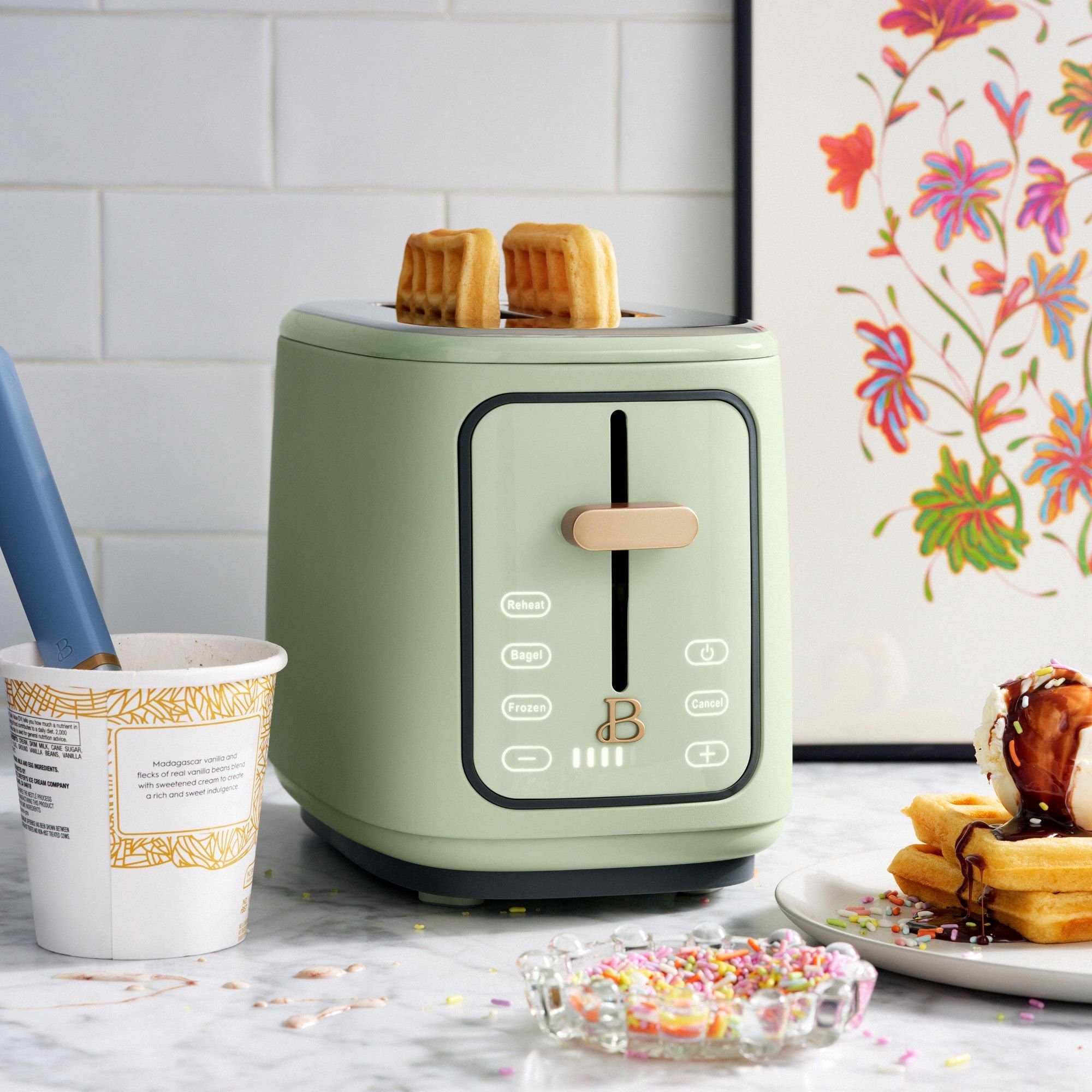 The toaster with a touchscreen toasting two waffles
