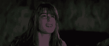 gif of Sidney grabbing her face in shock and fear, and running away