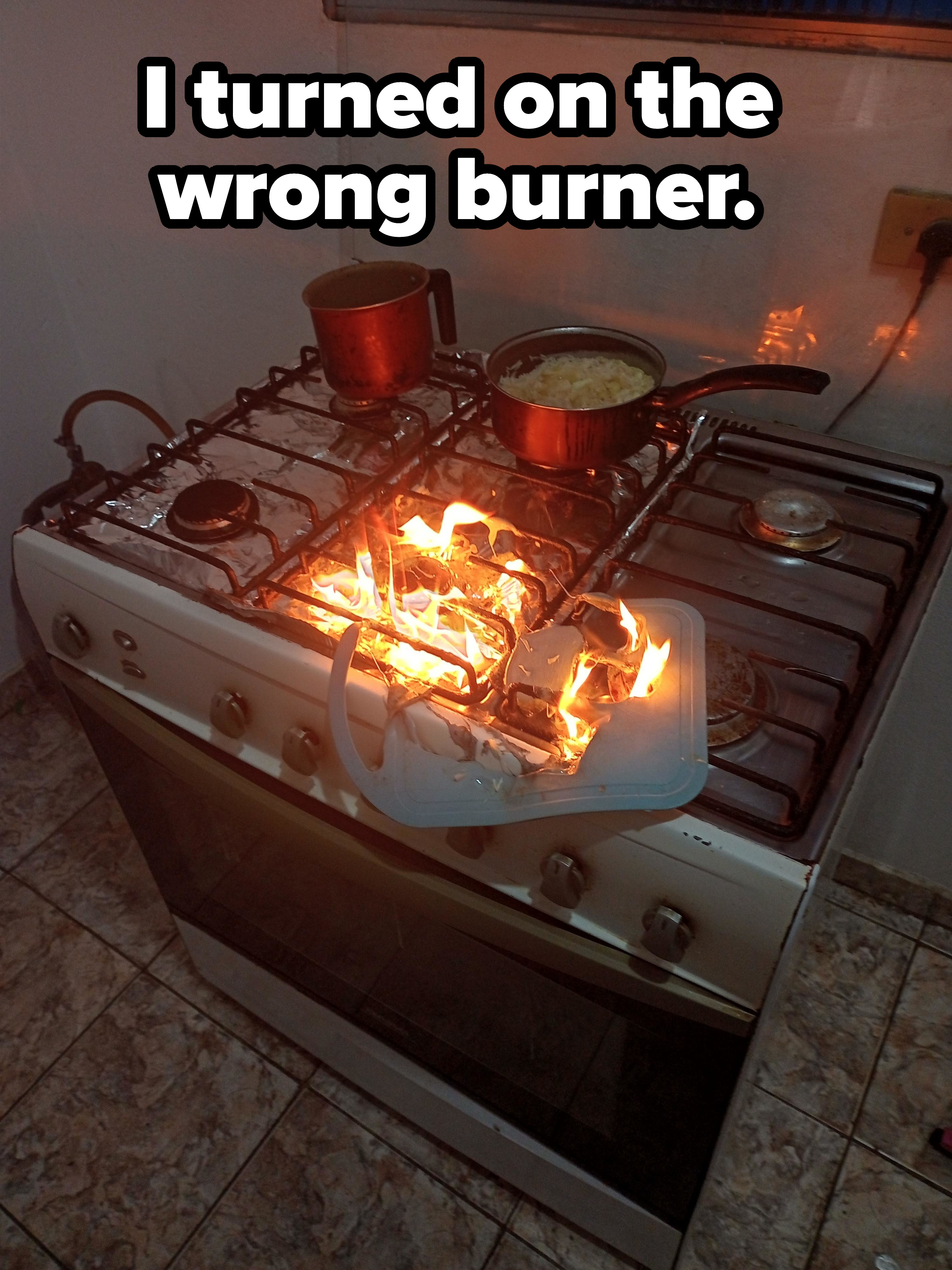 person who turned on the wrong burner and burner a cutting board