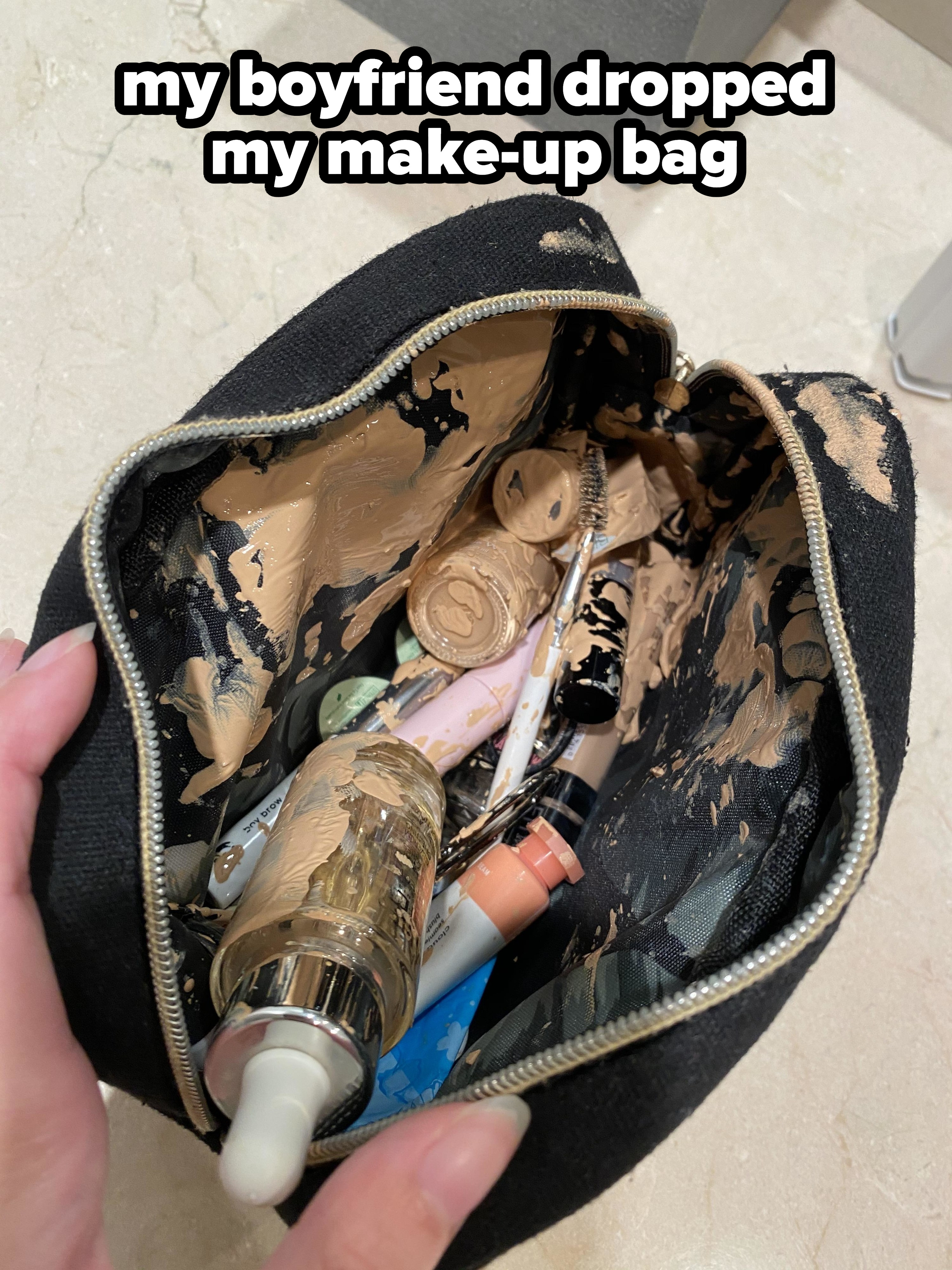 dropped make-up bag with brown goop in it