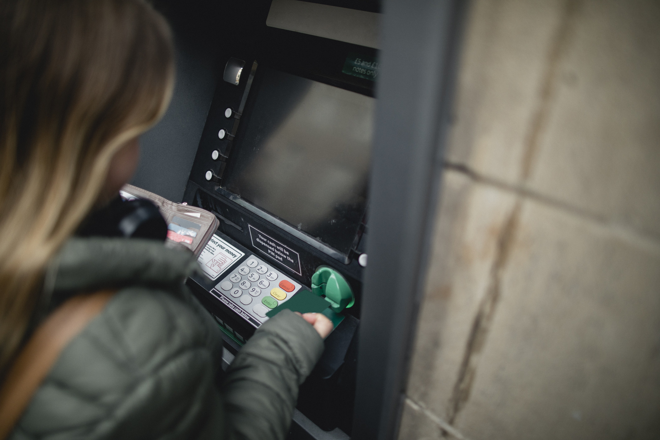 woman at an ATM