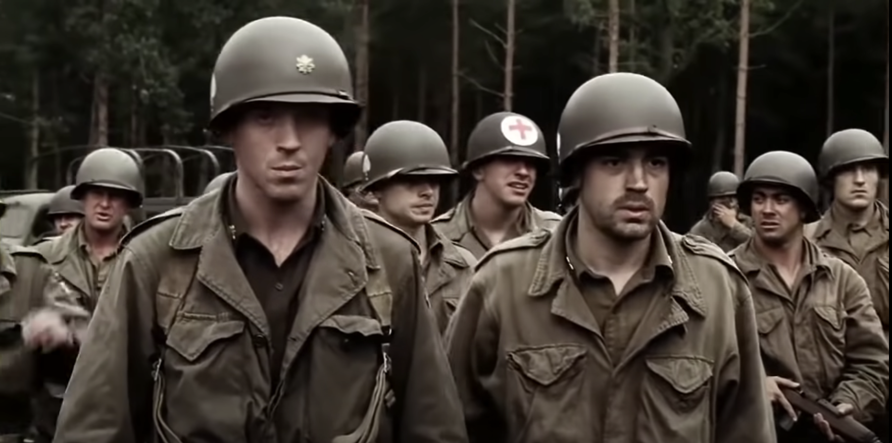 Men in military uniform standing in rows