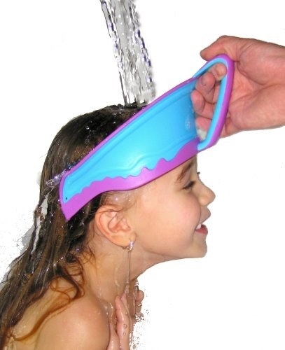 the purple and blue visor being used on a child&#x27;s head