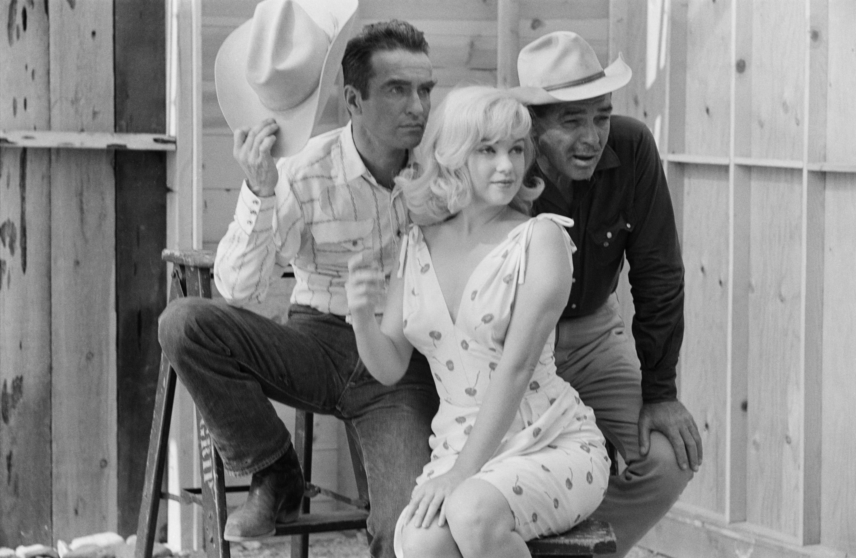 American actors Montgomery Clift, Marilyn Monroe and Clark Gable pose for a publicity shoot for the film &#x27;The Misfits&#x27;, USA, 1960