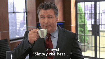 Alec Baldwin sipping from teacup [singing] &quot;simply the best...&quot;