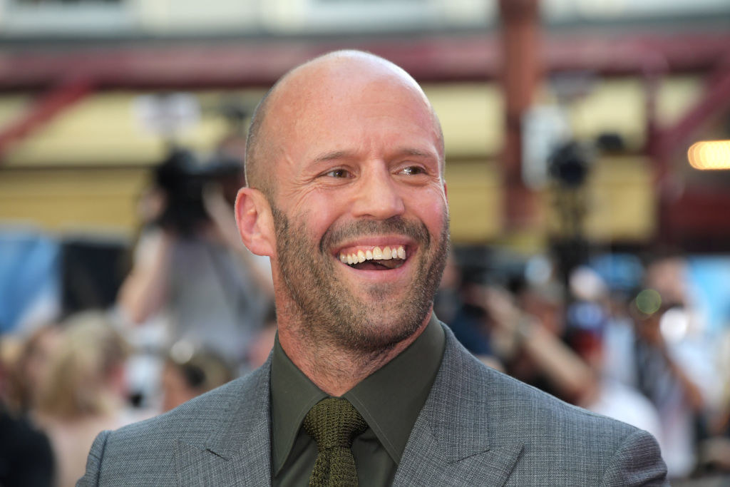 jason statham smiling on the red carpet