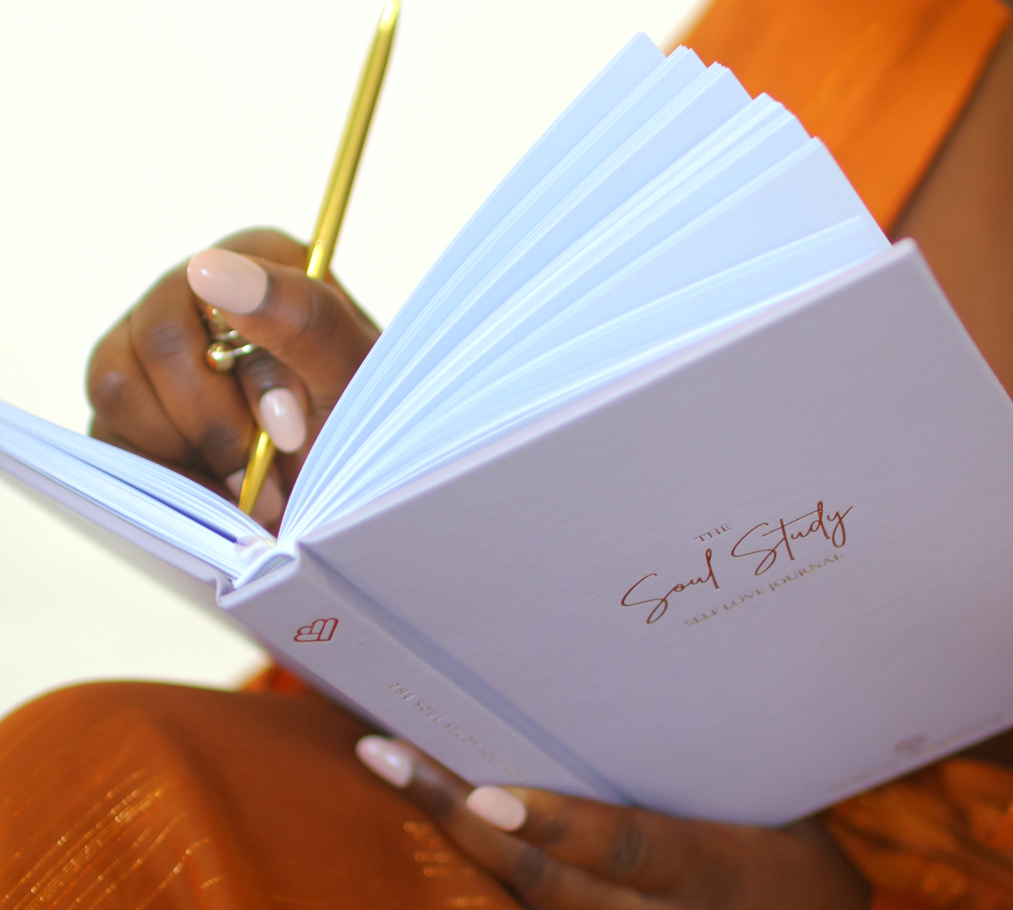 Denise writing in soul study journal