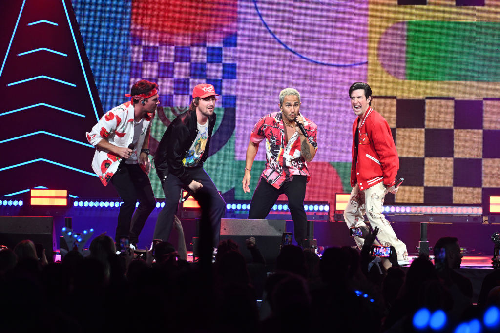 big time rush performing at y100 jingle ball in 2022