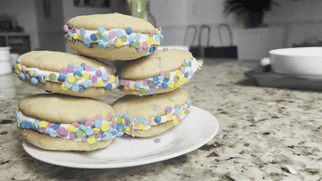plate of cookie sandwiches