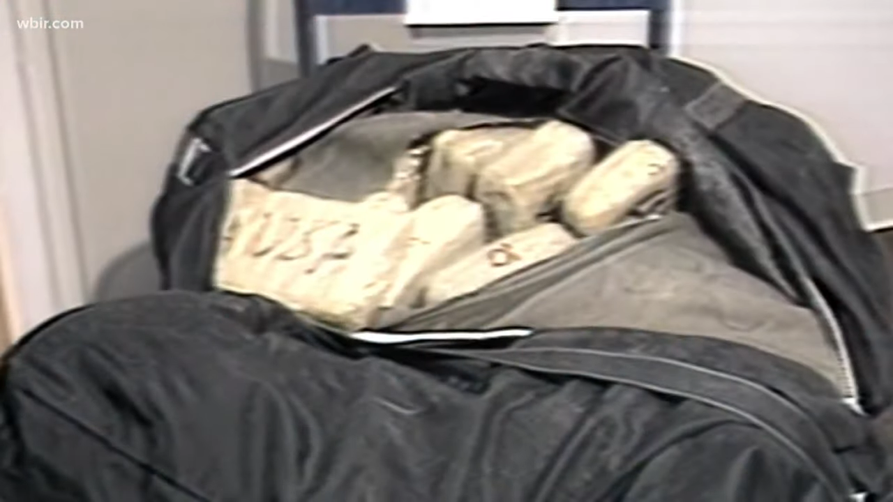 News footage of duffel bag full of cocaine