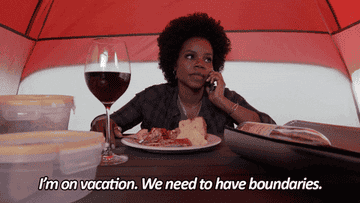 Woman eating dinner and saying &quot;I&#x27;m on vacation, we need to have boundaries&quot;
