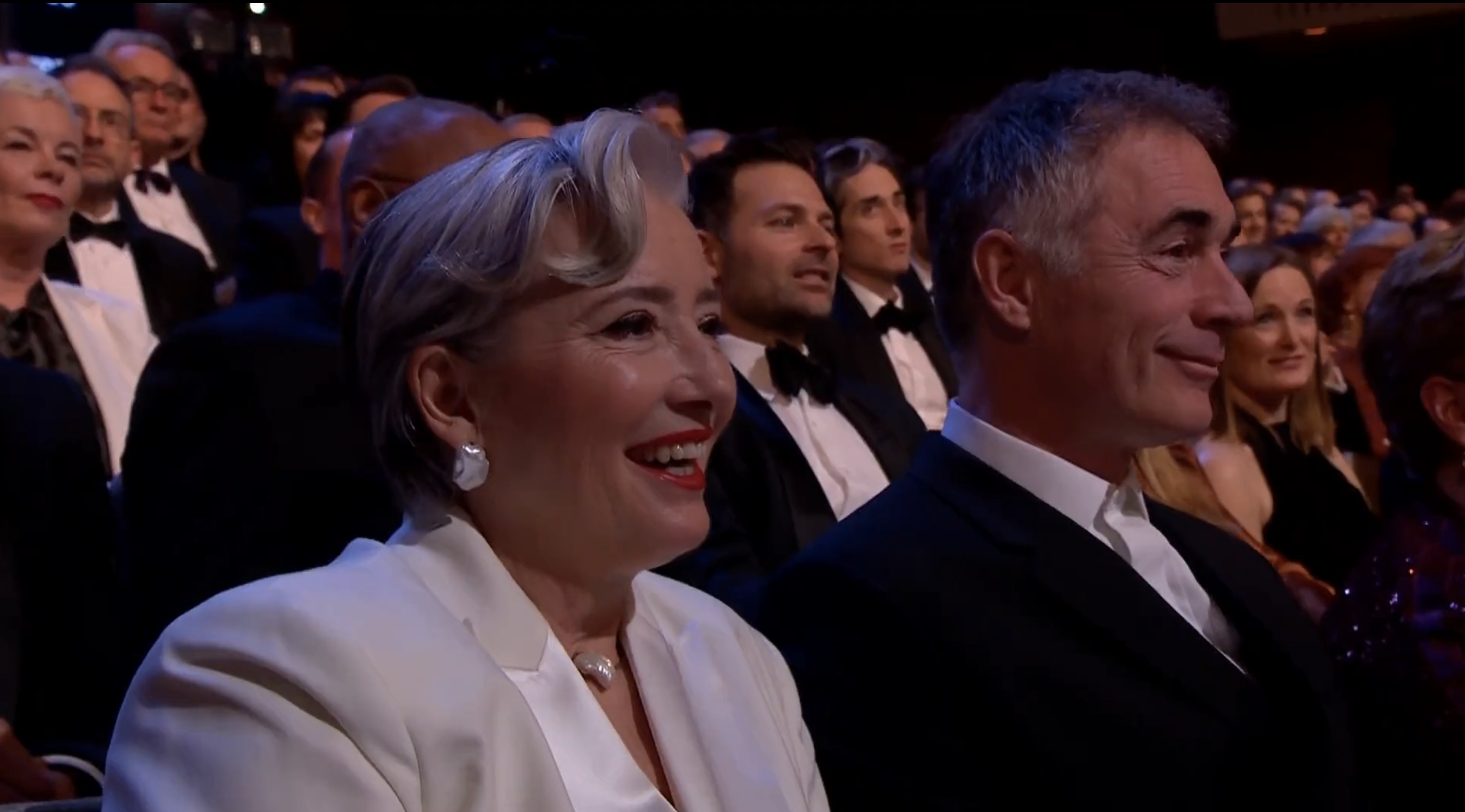 closeup of emma in the audience smiling
