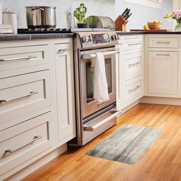 a Beveled kitchen floor mat on a wooden floor in a kitchen