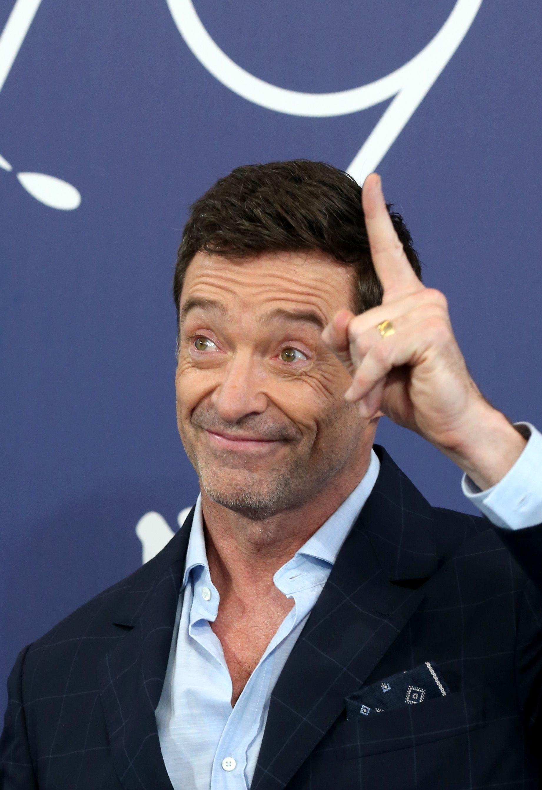 hugh pointing up