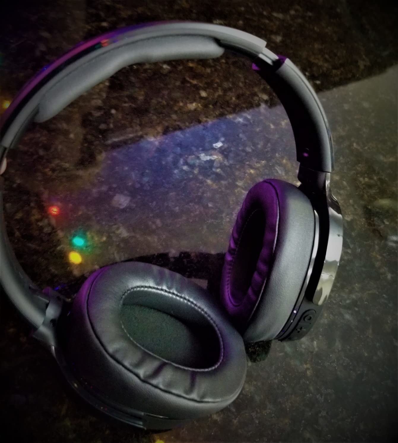 a reviewer photo of the black headphones