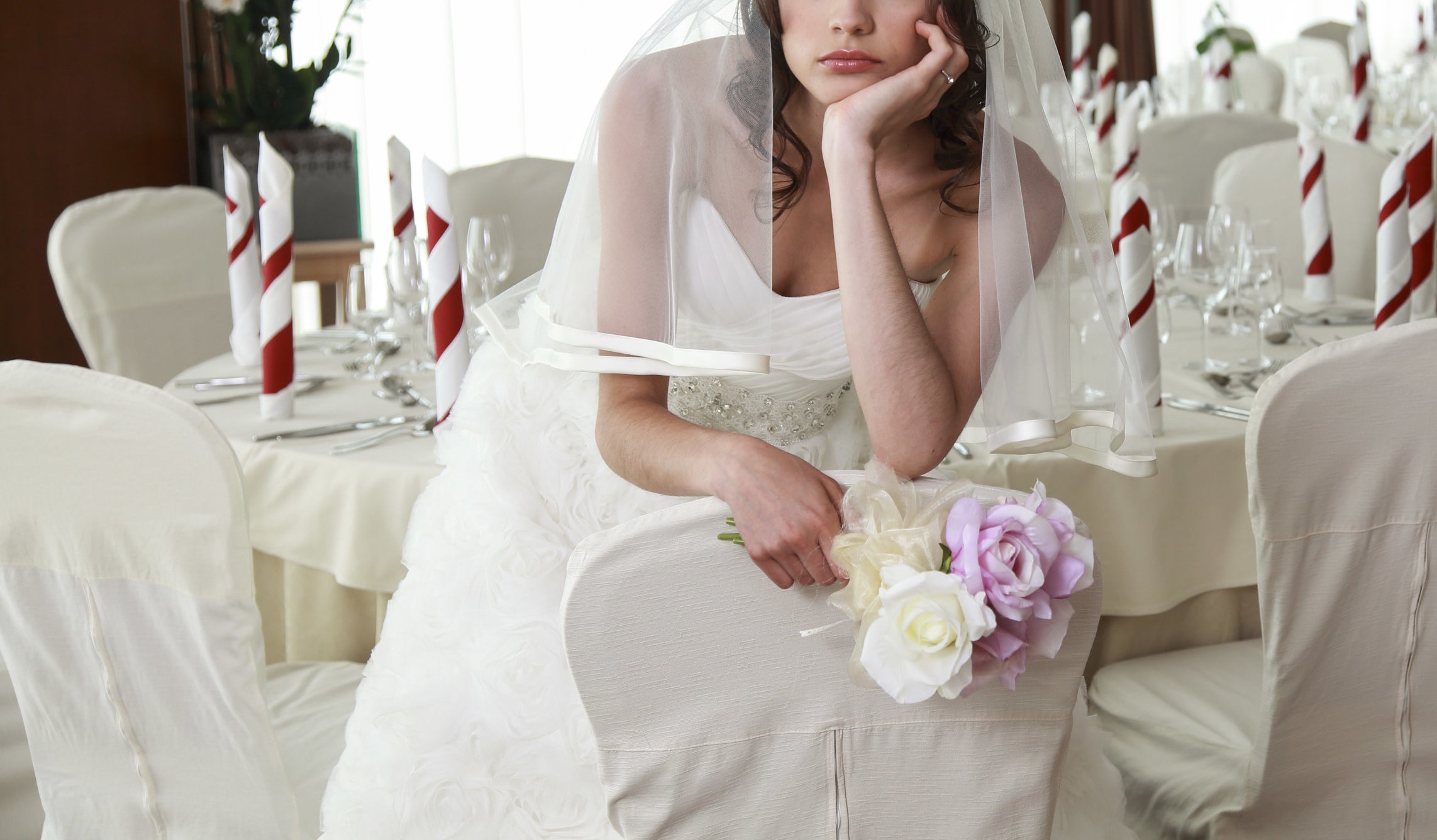 bride pouting after being left on wedding day