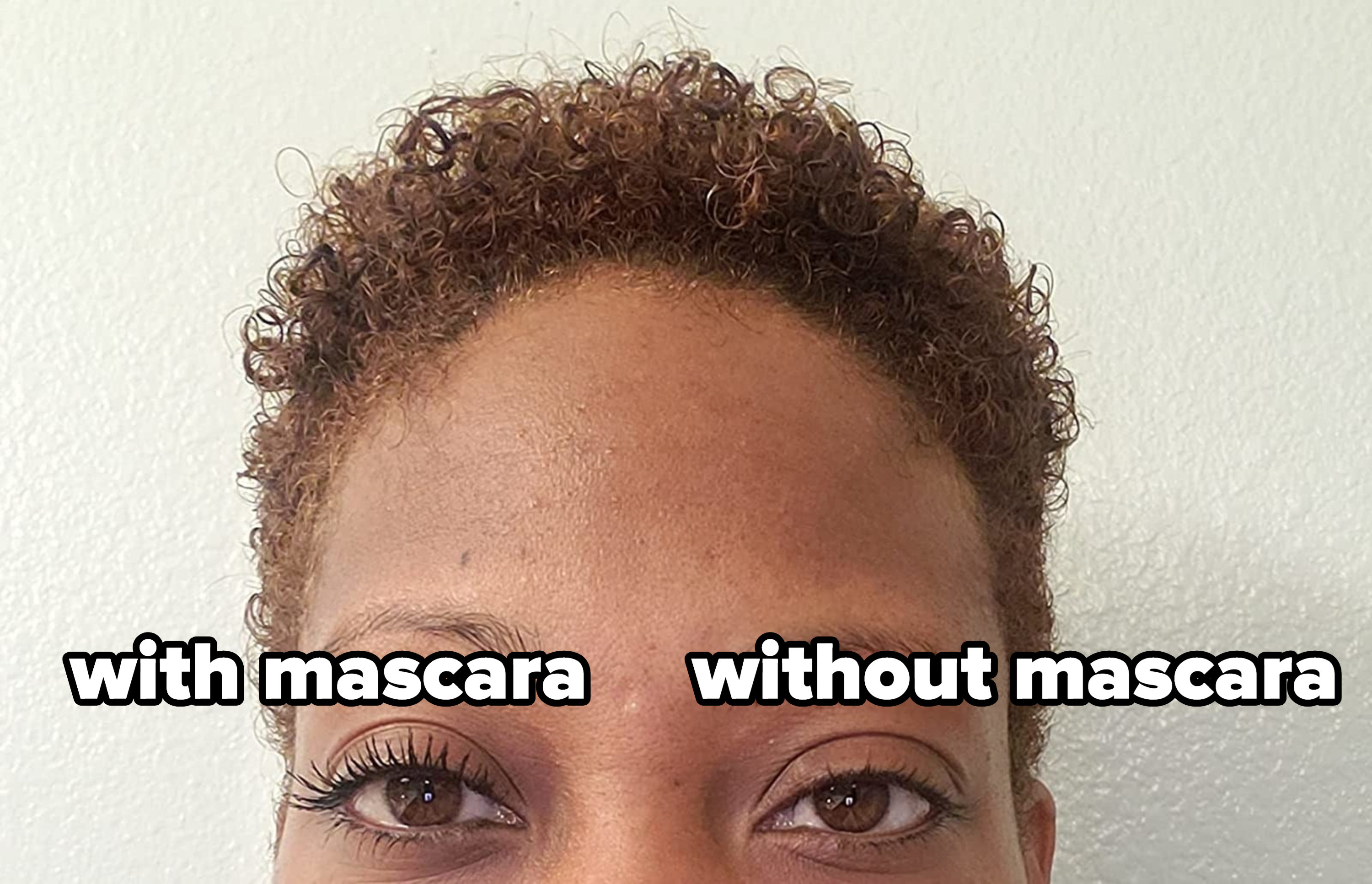 a reviewer with mascara on their left eye