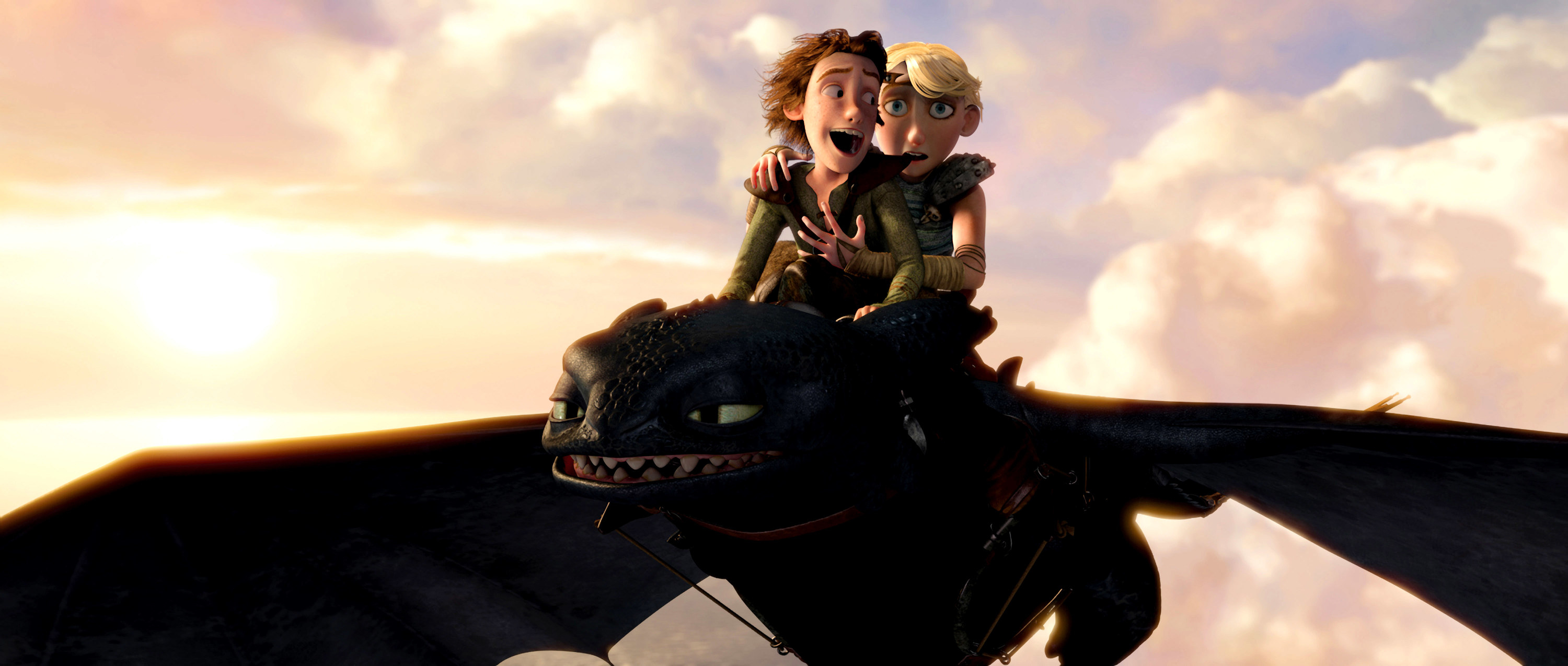 Two teens ride on a dragon
