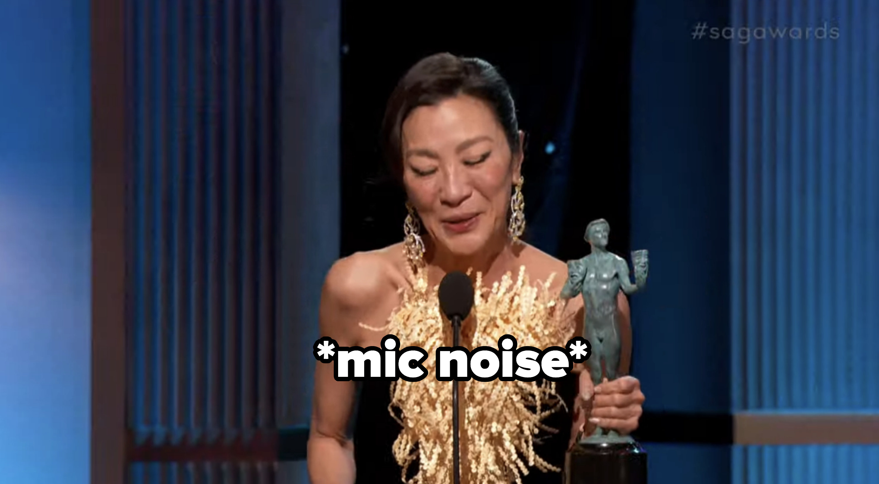Michelle Yeoh accepting her SAG award