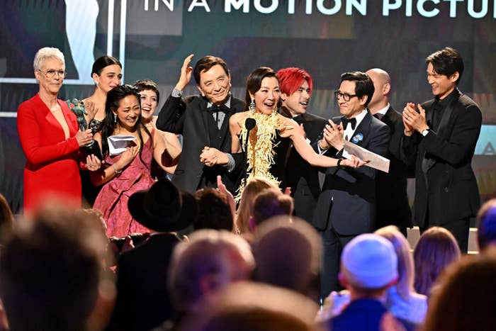 Jamie Lee Curtis, Jenny Slate, Stephanie Hsu, Tallie Medel, Brian Le, James Hong, Andy Le, Michelle Yeoh, Ke Huy Quan and Harry Shum Jr. accept the Outstanding Performance by a Cast in a Motion Picture award for &quot;Everything Everywhere All at Once&quot;