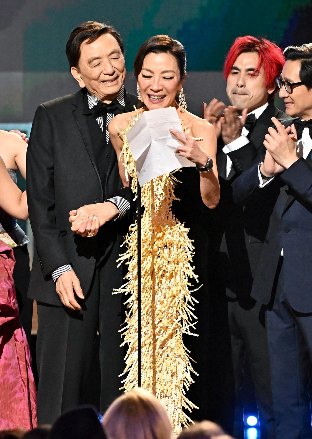 Michelle Yeoh accepts the award for Ensemble Cast in a Motion Picture for Everything Everywhere All At Once