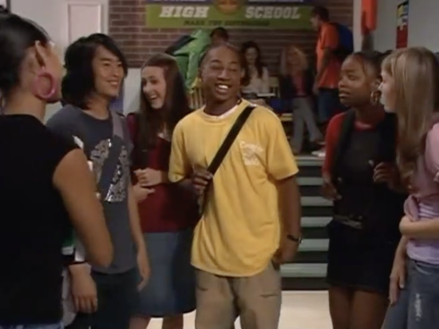 young Lil JJ in a school hallway for a scene